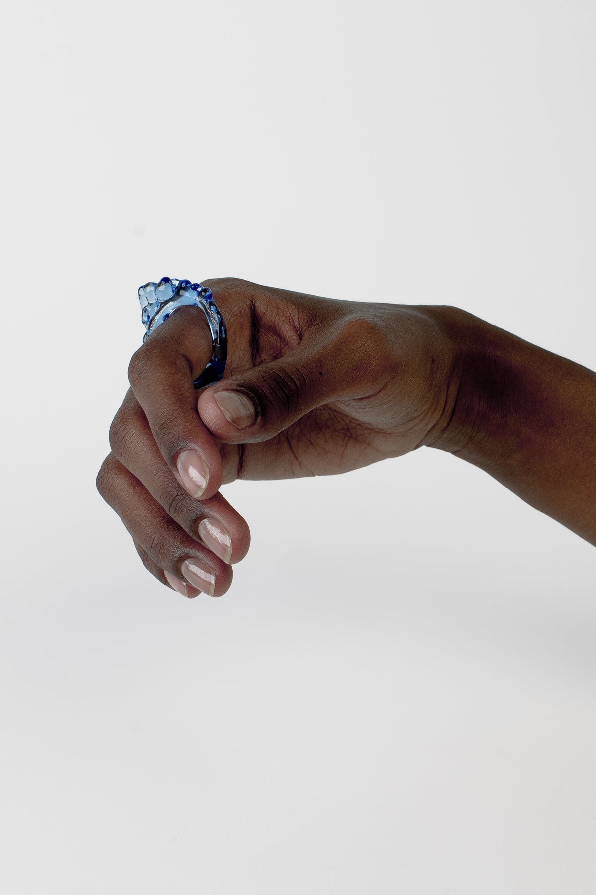 Chunky Beaded Glass Ring 0093 in sky blue worn on the hand, hand-sculpted borosilicate glass by Rain and Rivers, Barcelona