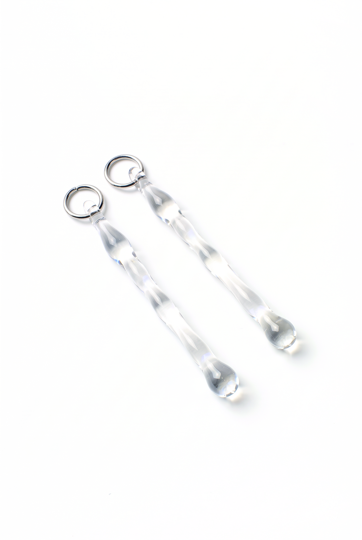 Rain and Rivers Drop Earrings 0004 – pair of hand-sculpted long clear borosilicate glass drop earrings, handmade in Barcelona, product photo on white