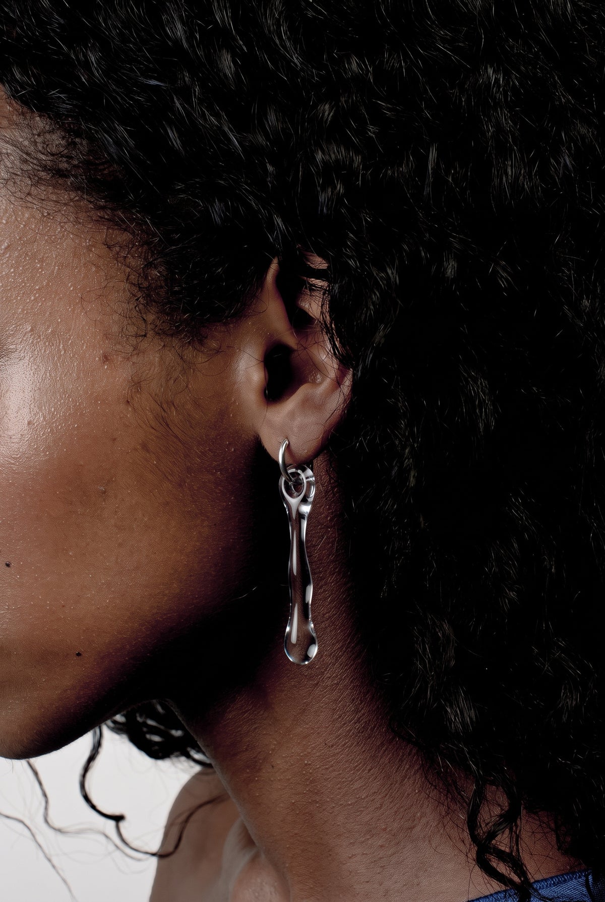 Hoop Earrings 0010 in clear hand-sculpted borosilicate glass, worn on the ear, Rain and Rivers