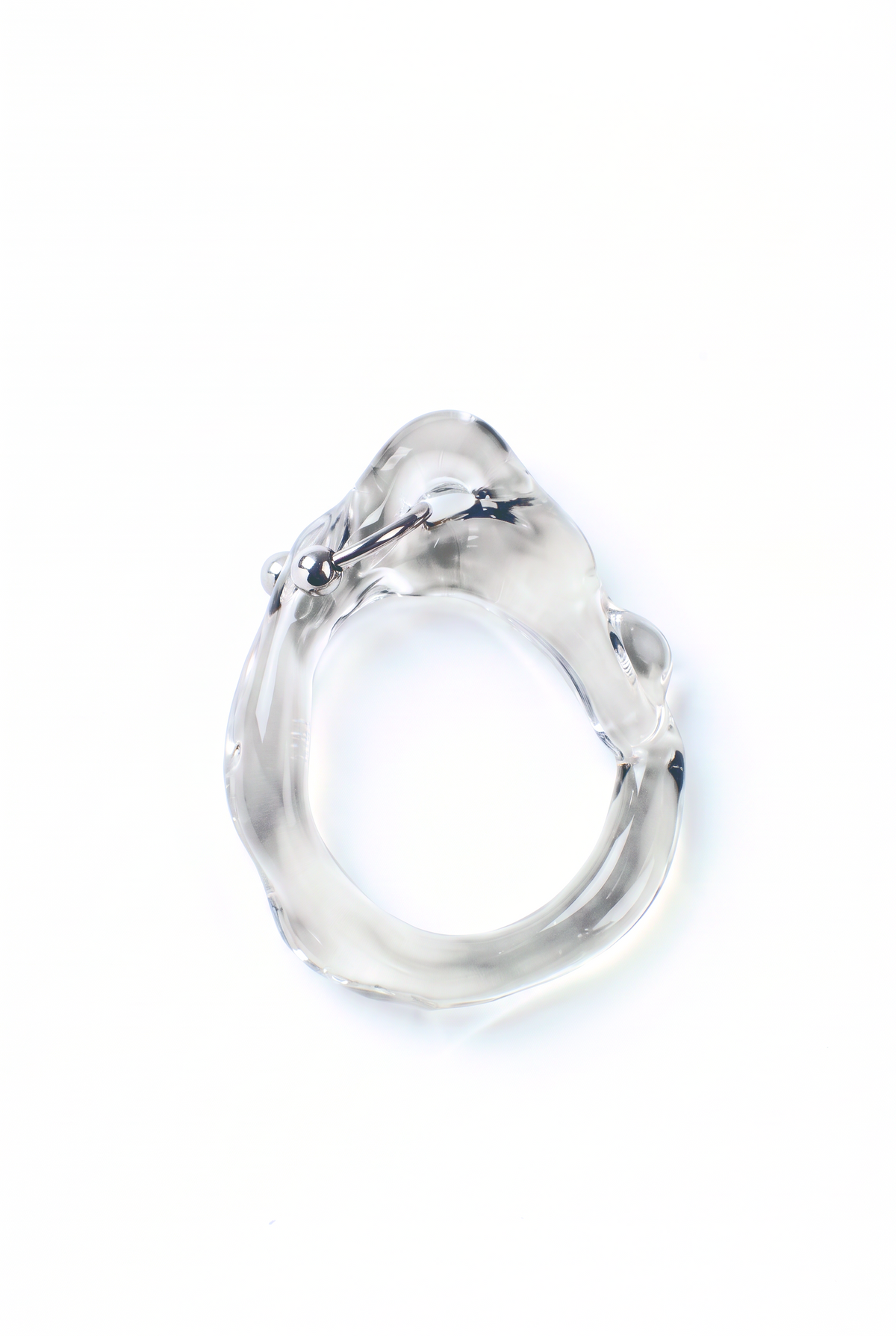 Rain and Rivers Pierced Glass Ring 0001 – hand-sculpted clear borosilicate glass ring with stainless steel horseshoe piercing, handmade in Barcelona, product photo on white