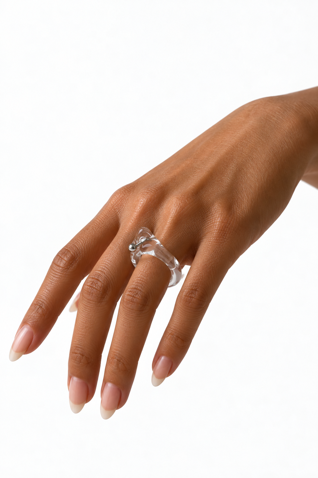 Pierced Glass Ring 0001 by Rain and Rivers: a handmade clear glass band pierced with a stainless steel horseshoe, worn on the hand, on a white background