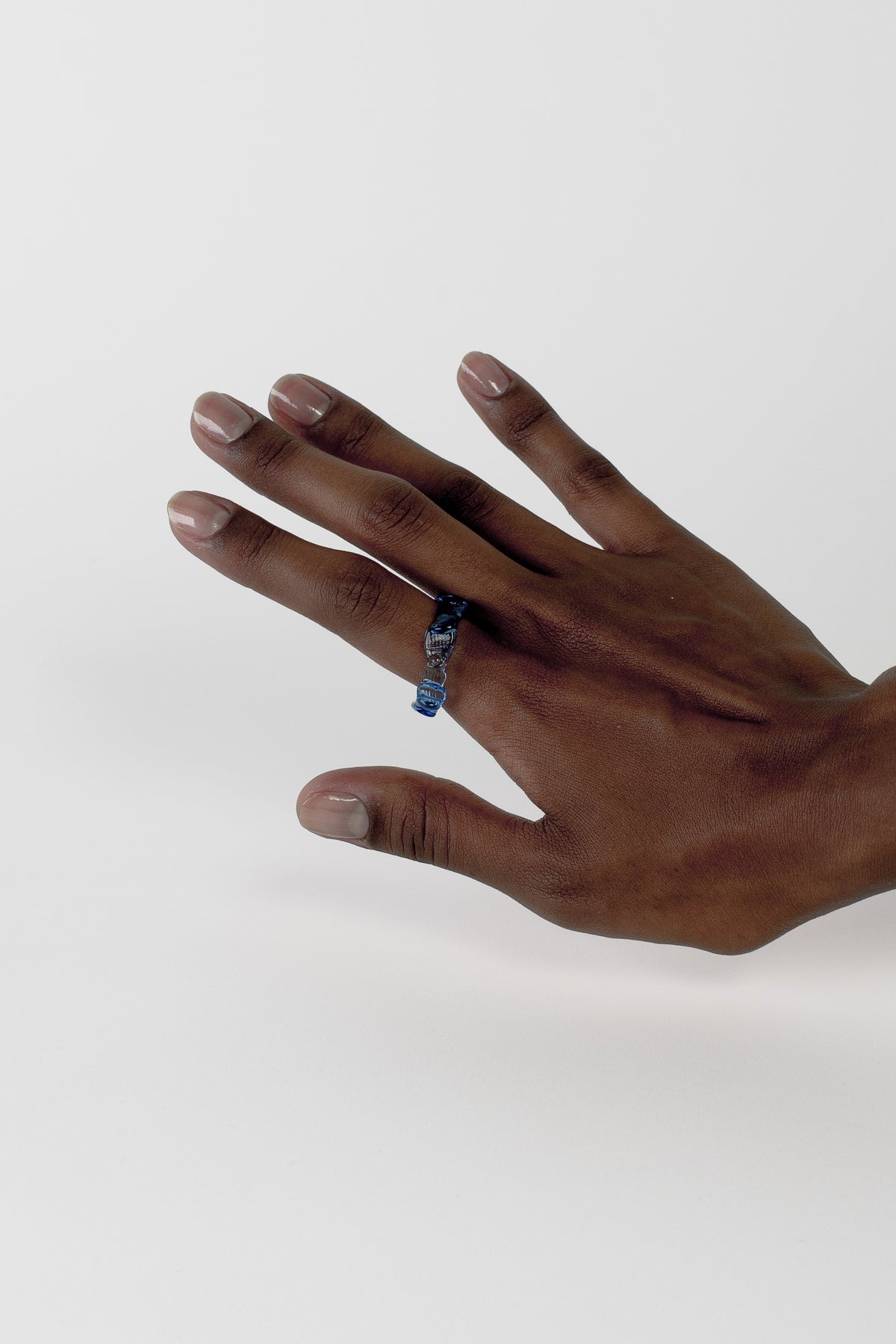 Textured Stacking Glass Rings 0124 in sky blue on the hand