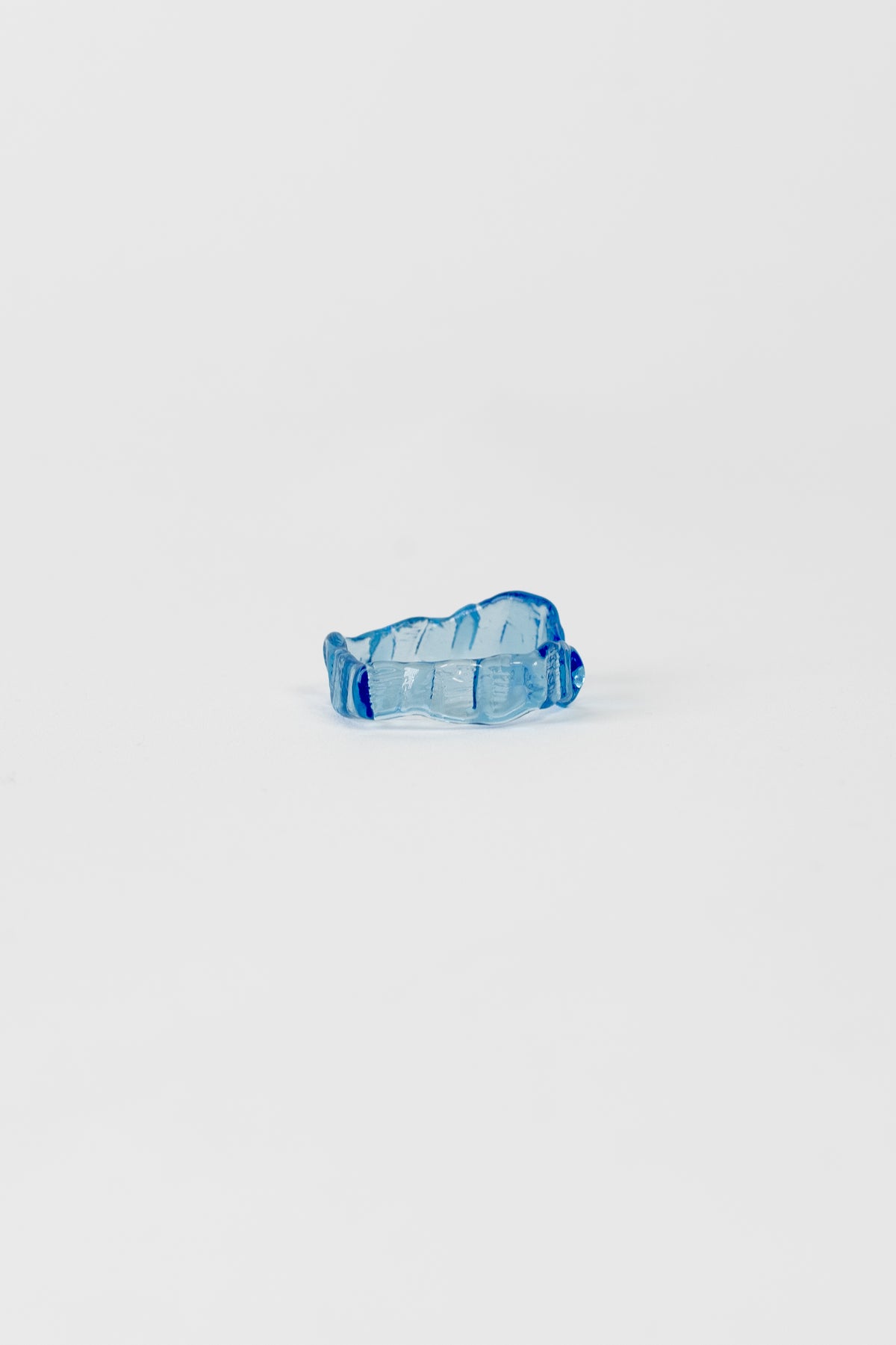 Textured Stacking Glass Ring 0124 in sky blue, lying flat