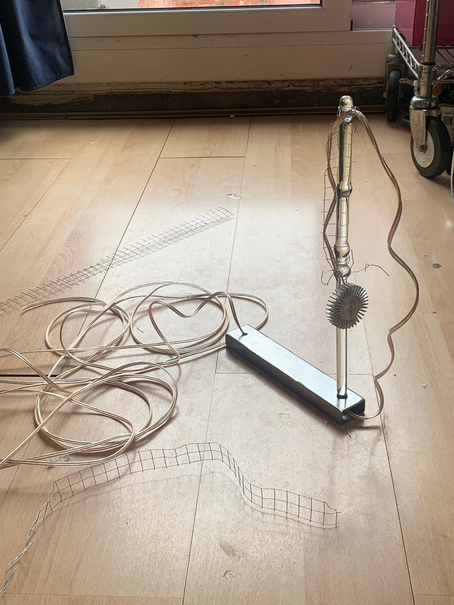 Acción y Destino (2026), lighting choreography with motorized sculptures and glass lamps by Magdalena Hart, image 2 of 11