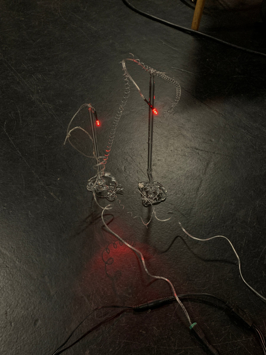 Acción y Destino (2026), lighting choreography with motorized sculptures and glass lamps by Magdalena Hart, image 5 of 11