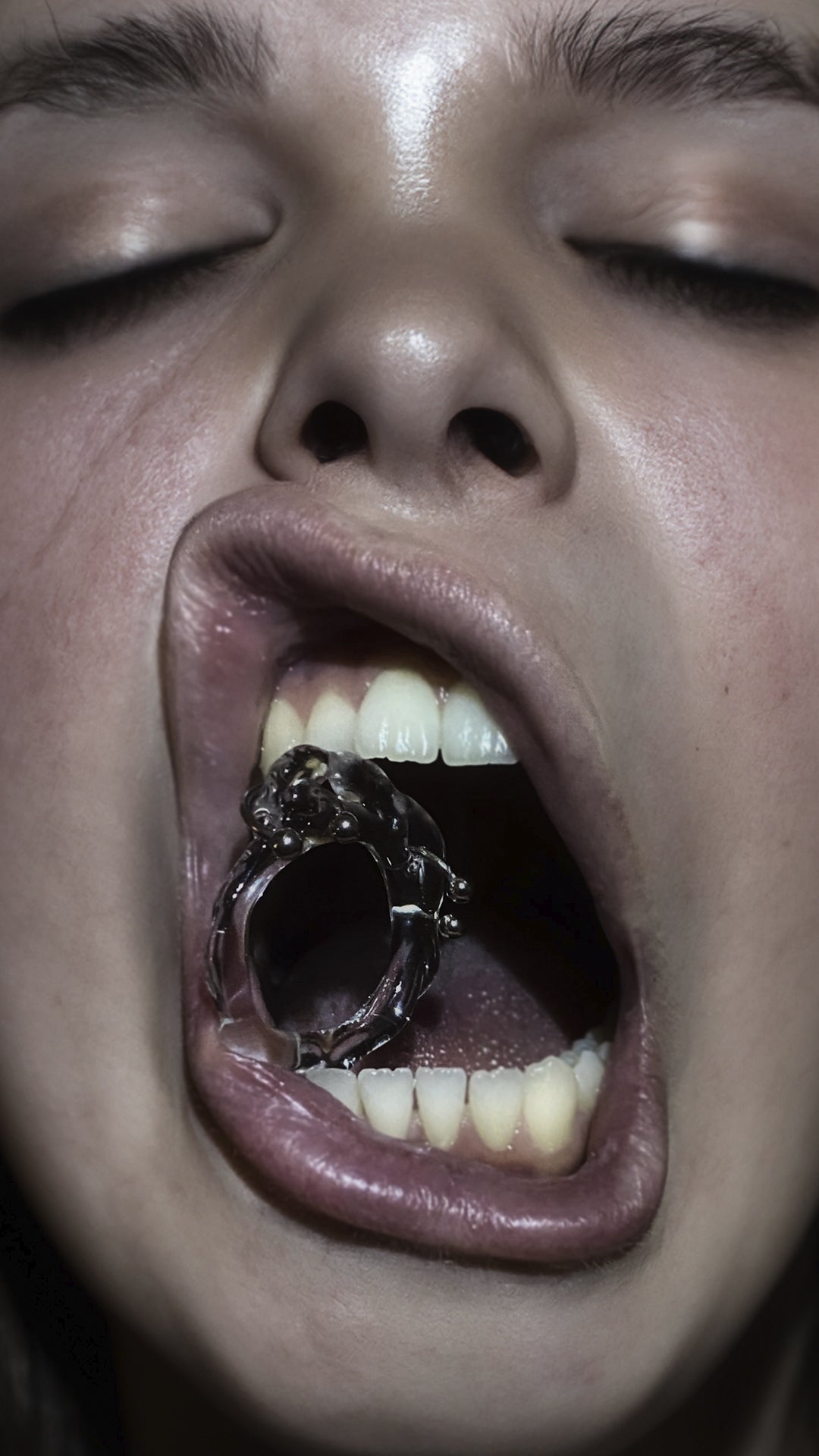 Organic Pierced Glass Ring 0062 in hand-sculpted borosilicate glass, editorial portrait, Rain and Rivers