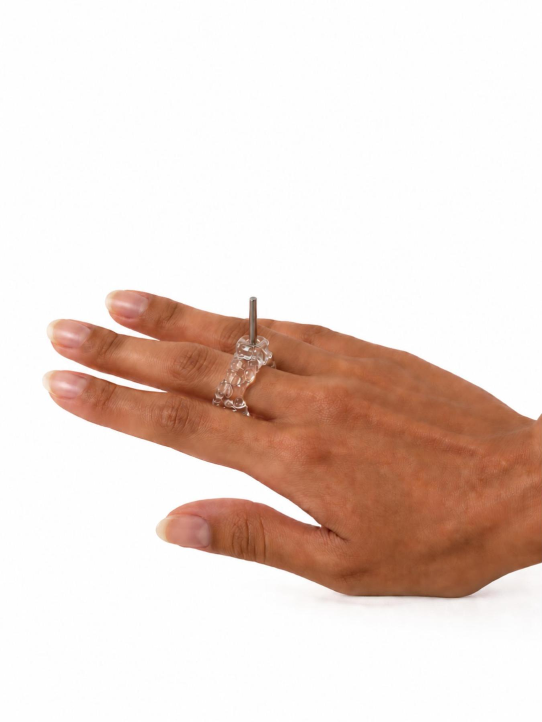 Candle and Flower Glass Ring 0136 by Rain and Rivers without the candle, showing the stainless steel pin set into the textured handmade clear glass band that holds a taper candle or flower, worn on the hand