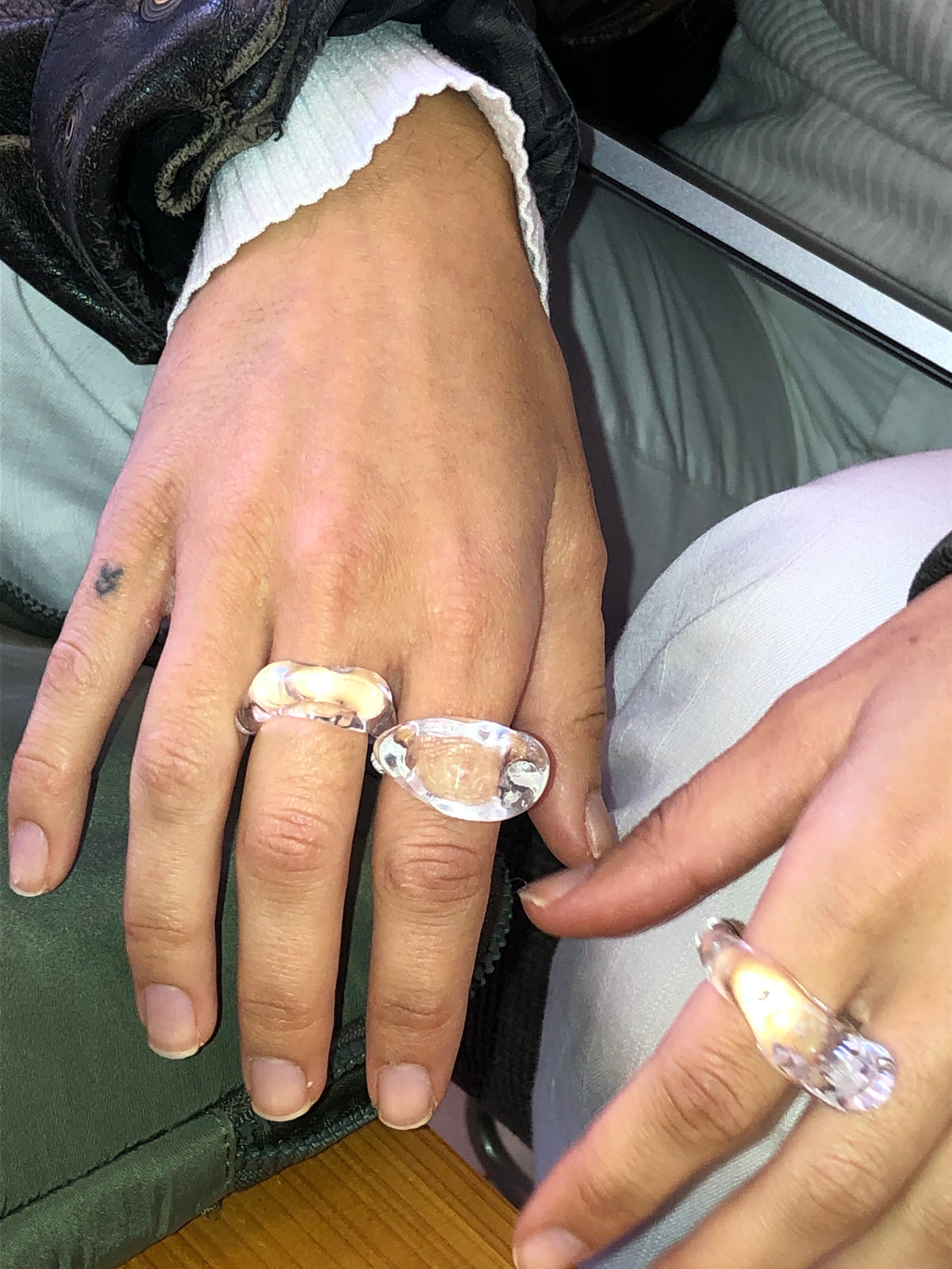 Chunky Signet Glass Ring 0108 in clear hand-sculpted borosilicate glass, worn on the hand, Rain and Rivers